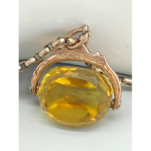 33 - Antique 9ct yellow gold and yellow glass swivel fob pendant and Victorian 9ct gold belcher chain. [H... 