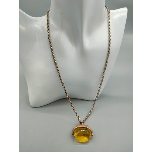 33 - Antique 9ct yellow gold and yellow glass swivel fob pendant and Victorian 9ct gold belcher chain. [H... 