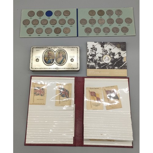 43 - Selection of commemorative coin sets and silk cigarette cards; Silver Jubilee George V Rowntree tin,... 