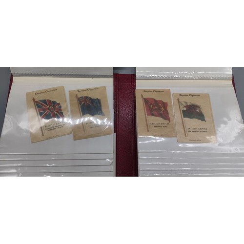 43 - Selection of commemorative coin sets and silk cigarette cards; Silver Jubilee George V Rowntree tin,... 