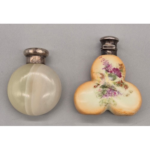 39 - Two silver topped perfume bottles; London silver top screw top and agate body, the other having a Bi... 