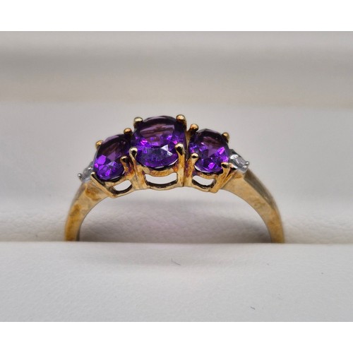 54 - 9ct yellow gold, amethyst and diamond stone ring. [Ring size T] [2.10grams]