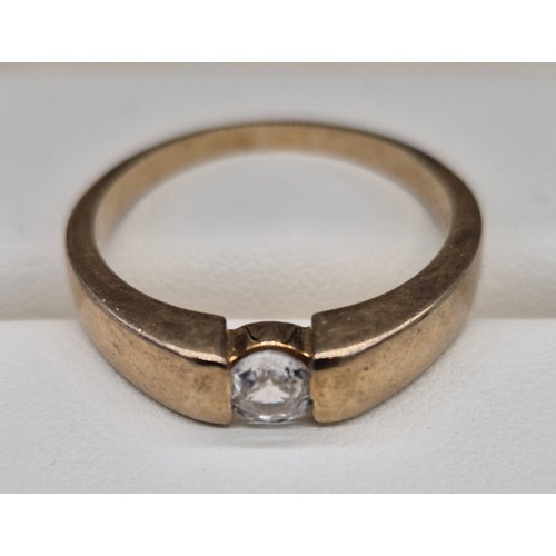 52 - 9ct yellow gold gents ring fitted with an Ice Zircon Stone. [Ring size W] [4.30Grams]