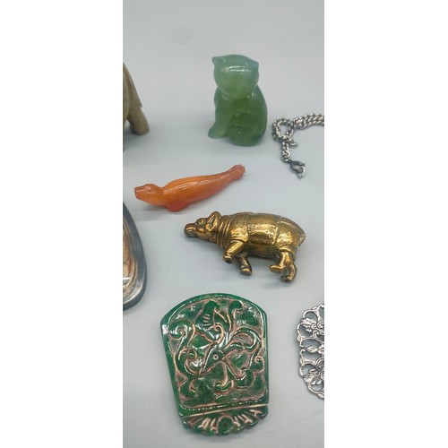 49 - Collection of Asian collectables; Hand carved amber seal sculpture, Chinese hand carved green jade c... 