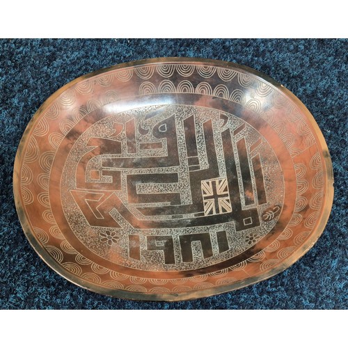 63 - 'The Great Royal Wedding' dish 'ARABIC', by Siddig El Nigoumi, earthenware, Britain, 1981.
Unglazed ... 