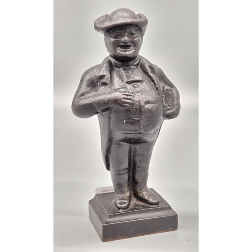 109 - 19th century Cast Iron Reverend Joshua Brooks. Old repair to ankle area. [15cm high]
