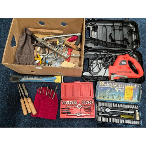 A collection of vintage tools, drill bits, chisels, vintage tools tap