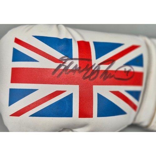 105 - Signed Frank Bruno boxing glove with photograph.