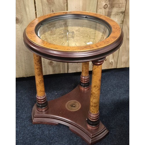 109 - The Royal Geographical Society Clock Table. Comes with leaflet. [49cm high, 41cm diameter]