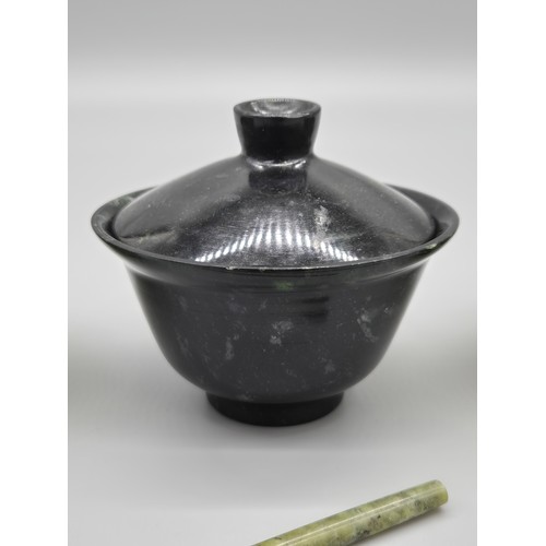 130 - Three Chinese tea cups; Dark jade tea cup with cover, pair of hard stone cups with duck finial spoon... 