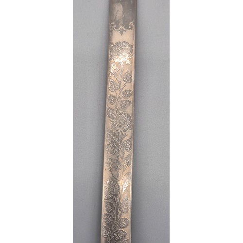 148 - Military Wilkinson Sword- Ceremonial sword. Engraved etched blade depicting rose and bush design. Br... 