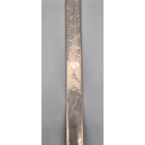 148 - Military Wilkinson Sword- Ceremonial sword. Engraved etched blade depicting rose and bush design. Br... 