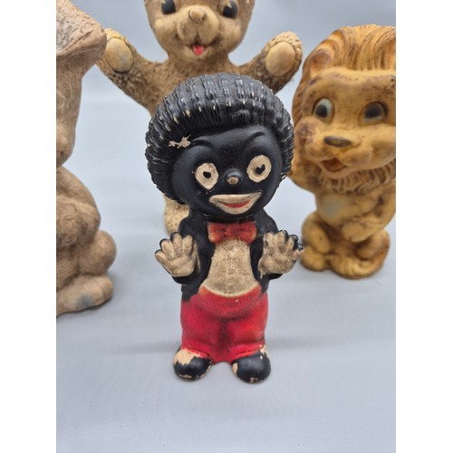 186 - A collection of four 1960s/70s squeeze toys; 1950s Combex Robertsons Golly, vintage lion squeeze toy... 