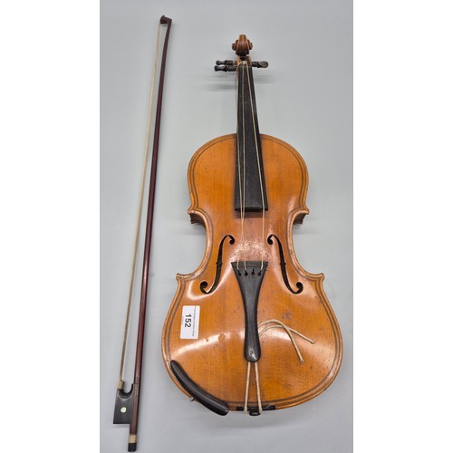 152 - Antique violin, bow and case. Label showing Manufactured in Berlin- Copy of Paulo Magini. Bow is nam... 