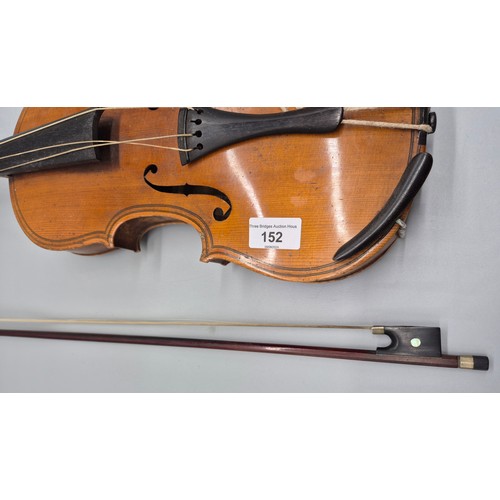 152 - Antique violin, bow and case. Label showing Manufactured in Berlin- Copy of Paulo Magini. Bow is nam... 