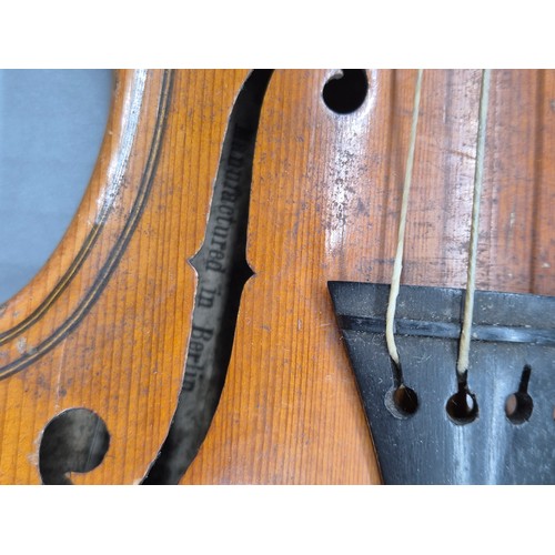 152 - Antique violin, bow and case. Label showing Manufactured in Berlin- Copy of Paulo Magini. Bow is nam... 