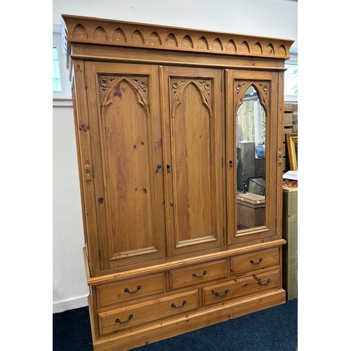 154 - Large Farm house style pine triple wardrobe with fitted mirror door & five drawers [210.5x161x62cm]