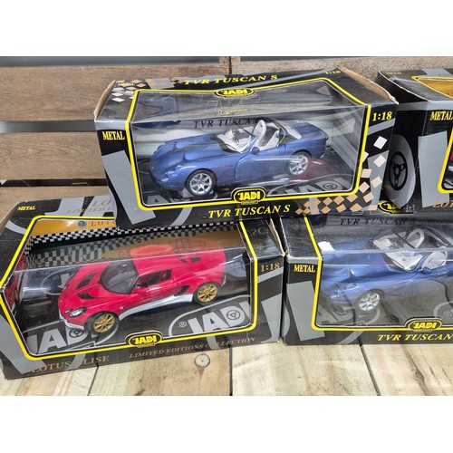 307 - A collection of of five Jadi model craft sport car models; Lotus Elise models & TVR Tuscan models