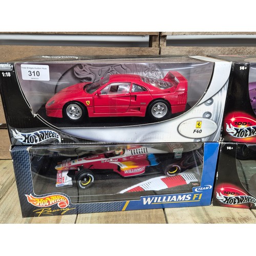 310 - A collection of four boxed hot wheels 1.18 scale models; TVR speed 12, Ferrari F40 & formula one Wil... 