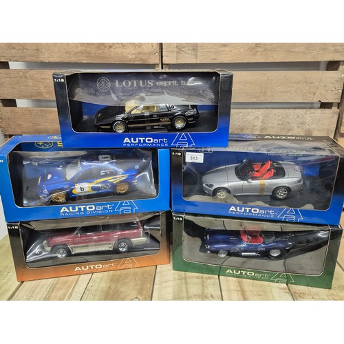 313 - A collection of five various boxed 1.18 scale models; Turbo Esprit, Subaru Impreza, Jeep model & spo... 