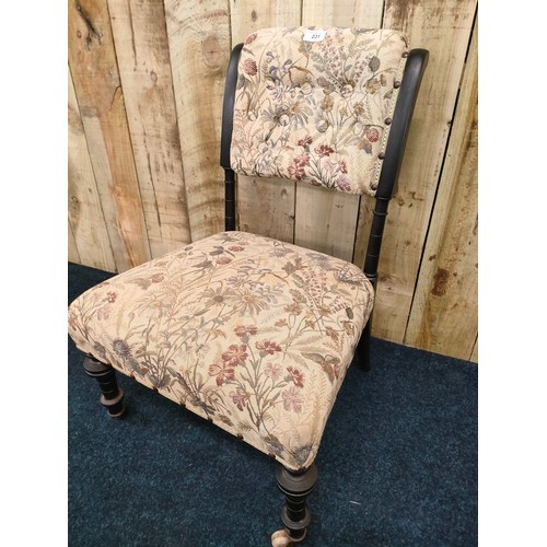 257 - 19th century ebonised wood button back nursing chair.