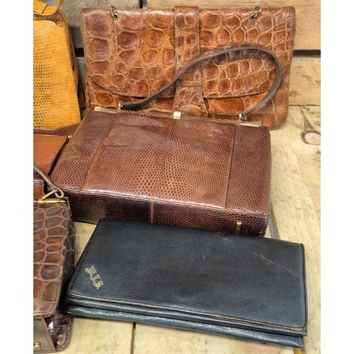 200 - A collection of nine vintage Crocodile and lizard skin clutch handbags; Mappin & Webb, Riviera bags ... 