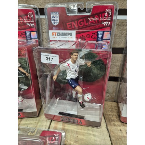 317 - A Collection of five England boxed football players action figures & two framed english league footb... 