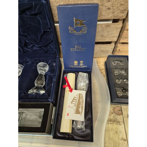 212 - A tray of crystal & collectables; british 1986 coin set, Crystal train carriage set, R.M.S Titanic A... 