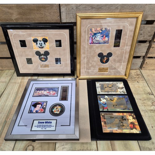 323 - A collection of three Walt Disney film cells together with Disney showcase plaques; Mickey Mouse, Th... 