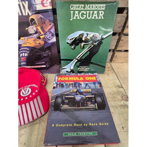 324 - A collection of formula one racing car & Jaguar books together with formula one Michael Schumacher c... 