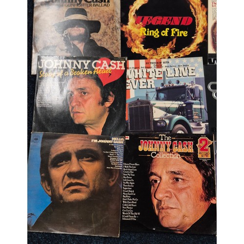 336 - A collection of country music LPs; Johnny Cash, Waylon, Neil Sedaka, 20 trucking hits white line fev... 