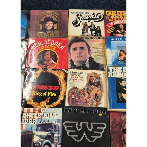 336 - A collection of country music LPs; Johnny Cash, Waylon, Neil Sedaka, 20 trucking hits white line fev... 