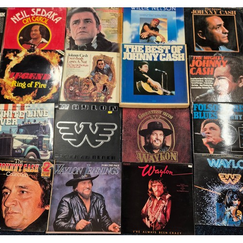 336 - A collection of country music LPs; Johnny Cash, Waylon, Neil Sedaka, 20 trucking hits white line fev... 