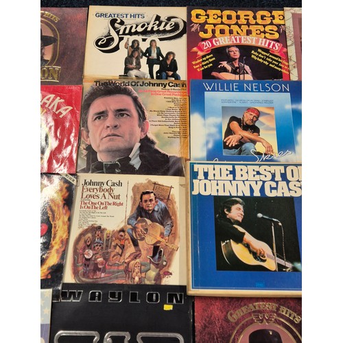 336 - A collection of country music LPs; Johnny Cash, Waylon, Neil Sedaka, 20 trucking hits white line fev... 