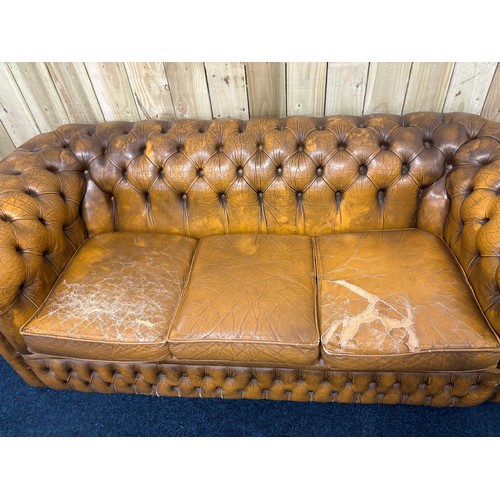 160 - Vintage Chesterfield mustard leather three seat sofa. [Cushion as found]