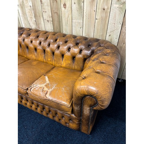 160 - Vintage Chesterfield mustard leather three seat sofa. [Cushion as found]