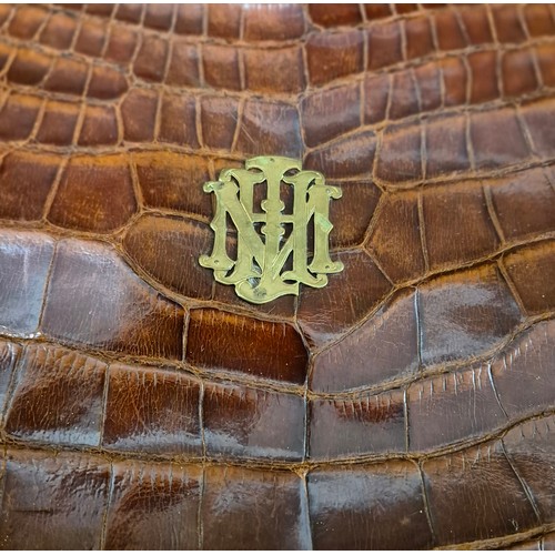 119 - Four various vintage crocodile leather hand bags; One fitted with Brass Initials and locks, Reid & T... 