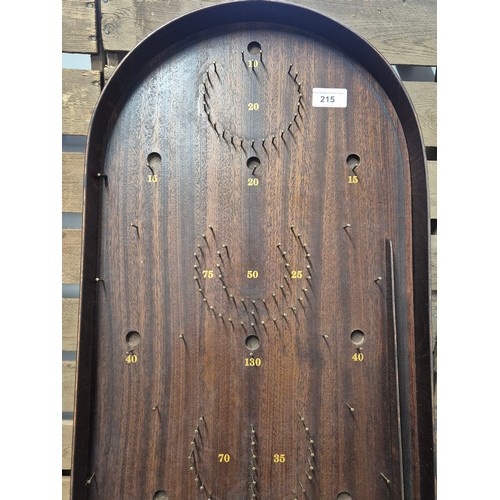 215 - A vintage House of marbles Bagatelle board [74cm height]