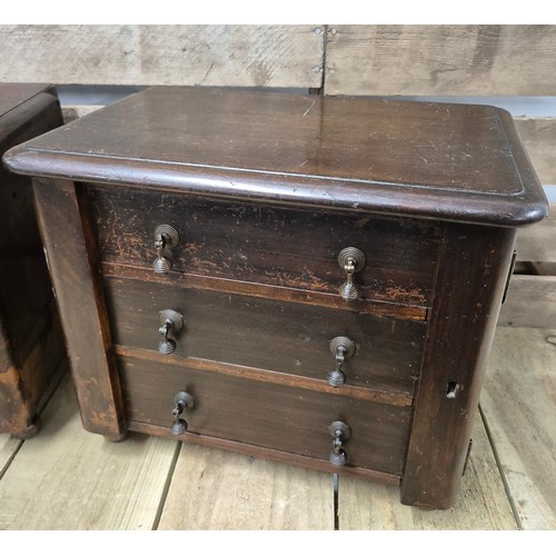 213 - A Pair of 20th century apprentice miniature Wellington 3 drawer chests [29.5x35x23.5cm]