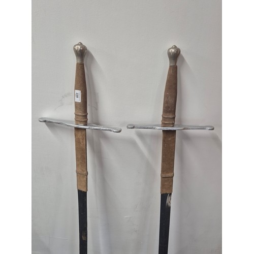 220 - A Pair of Reproduction William Wallace double handle swords