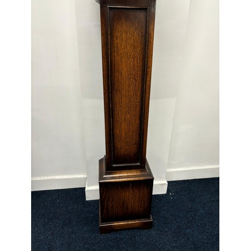 122 - Antique oak grandmother clock, Shaped top section, leading down to number dial, having barley twist ... 