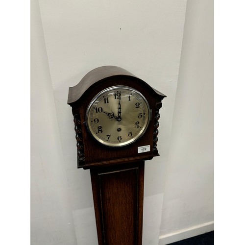 122 - Antique oak grandmother clock, Shaped top section, leading down to number dial, having barley twist ... 