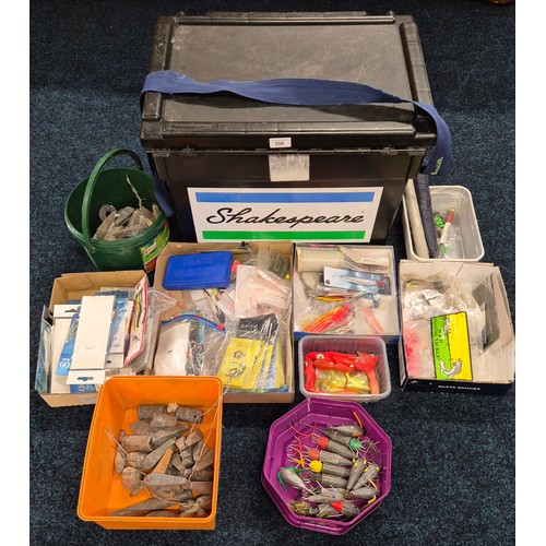 350 - Large Shakespeare fishing tackle box with a collection of fishing items; weights, fishing traces & o... 