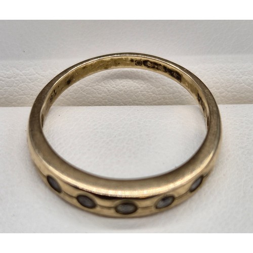 6 - 9ct Yellow gold ring set with five round cut diamonds. [Ring size Q] [2.24Grams]