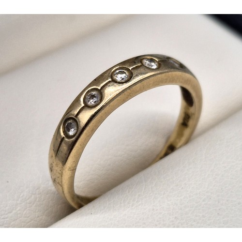 6 - 9ct Yellow gold ring set with five round cut diamonds. [Ring size Q] [2.24Grams]