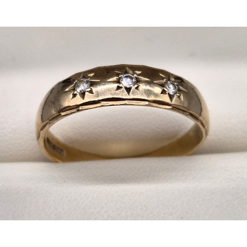 7 - 9ct yellow gold ring set with three round cut diamonds. [Ring size W] [2.80Grams]