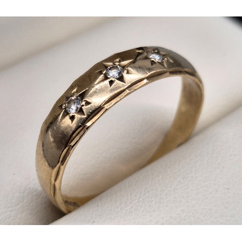 7 - 9ct yellow gold ring set with three round cut diamonds. [Ring size W] [2.80Grams]