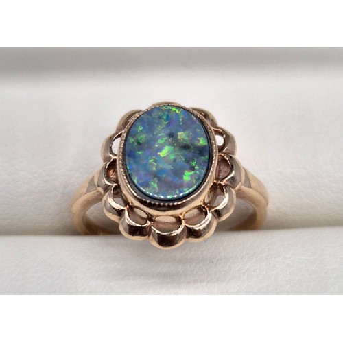 18 - Birmingham 9ct yellow gold and black opal ring. [Ring size M] [3.34grams]