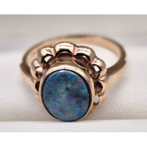 18 - Birmingham 9ct yellow gold and black opal ring. [Ring size M] [3.34grams]