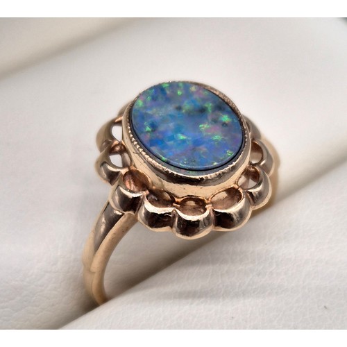 18 - Birmingham 9ct yellow gold and black opal ring. [Ring size M] [3.34grams]